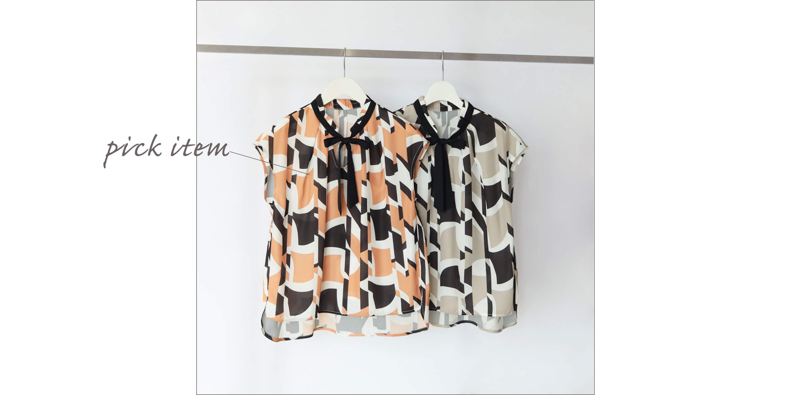 ジオメトリックリボンブラウス