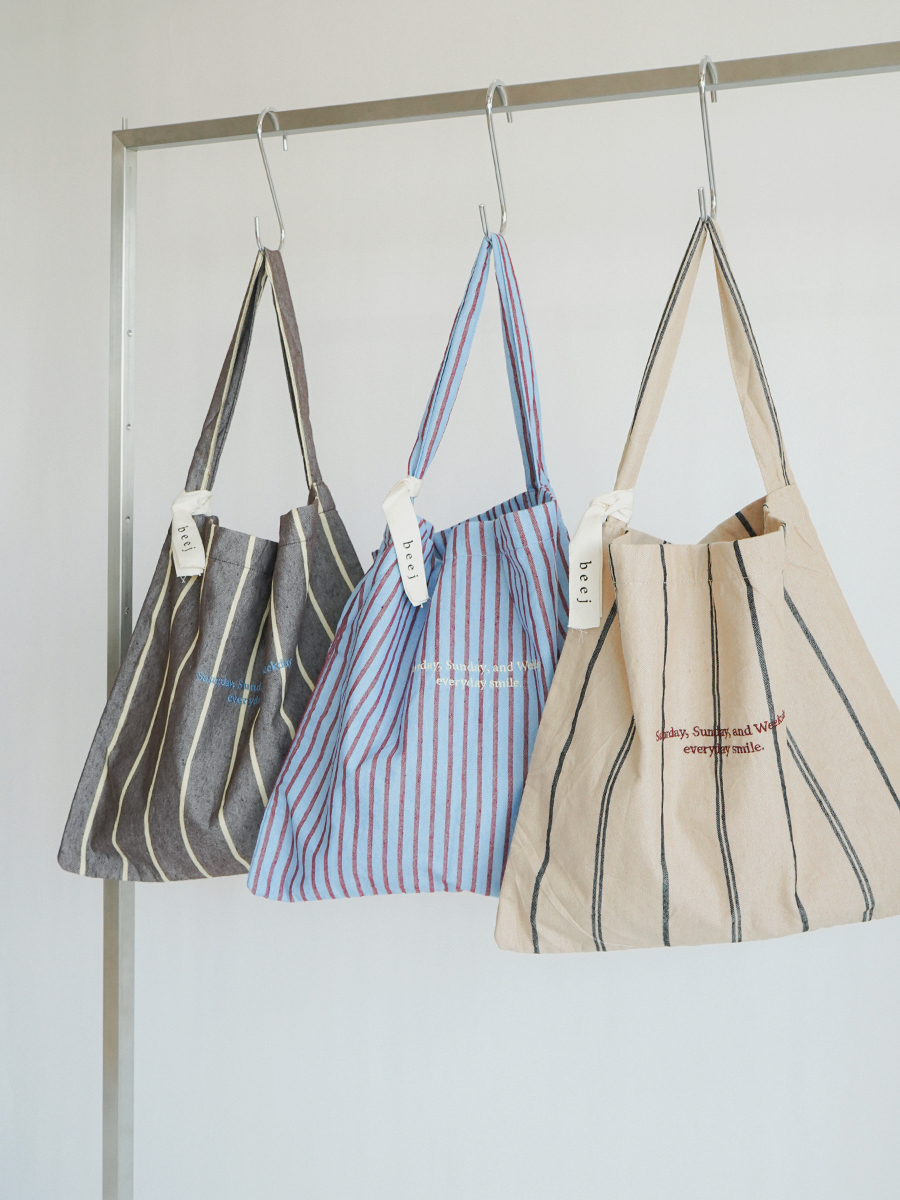 Striped fabric one-shoulder bag