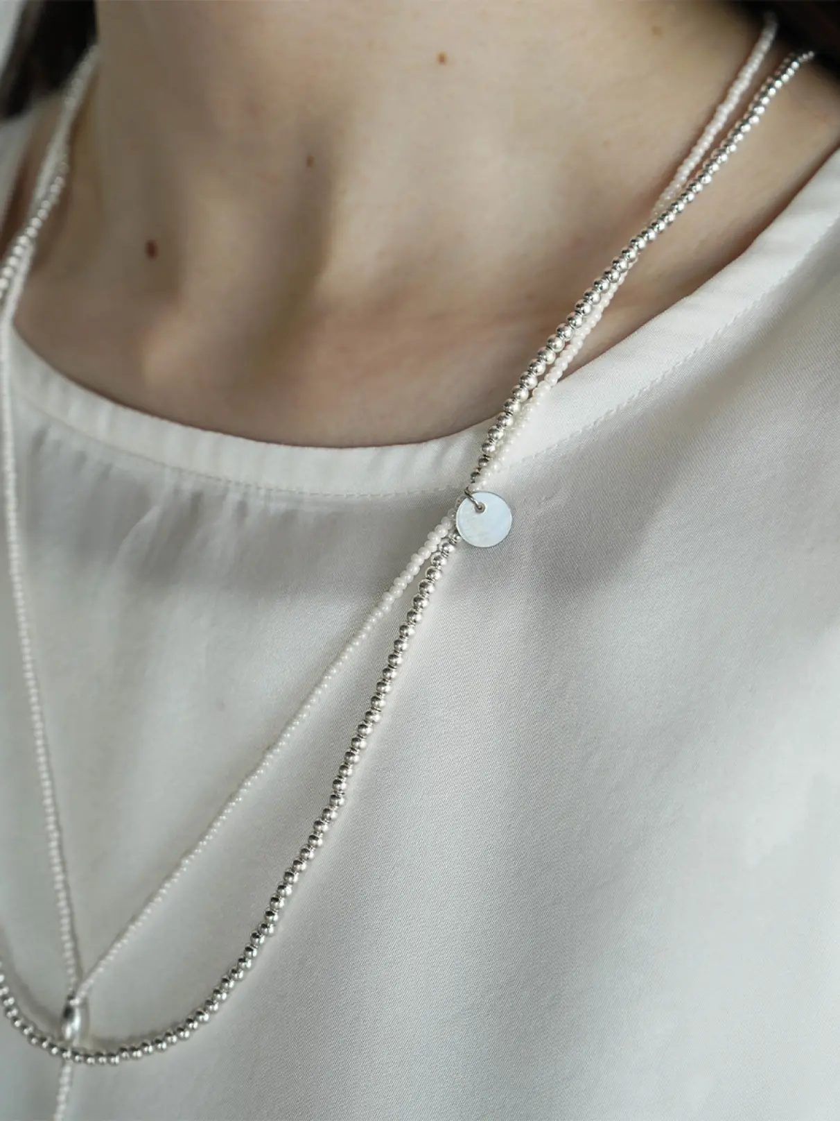 シルバーモチーフダブルロングネックレス〈316L-STAINLESS〉 - UNBEIGE